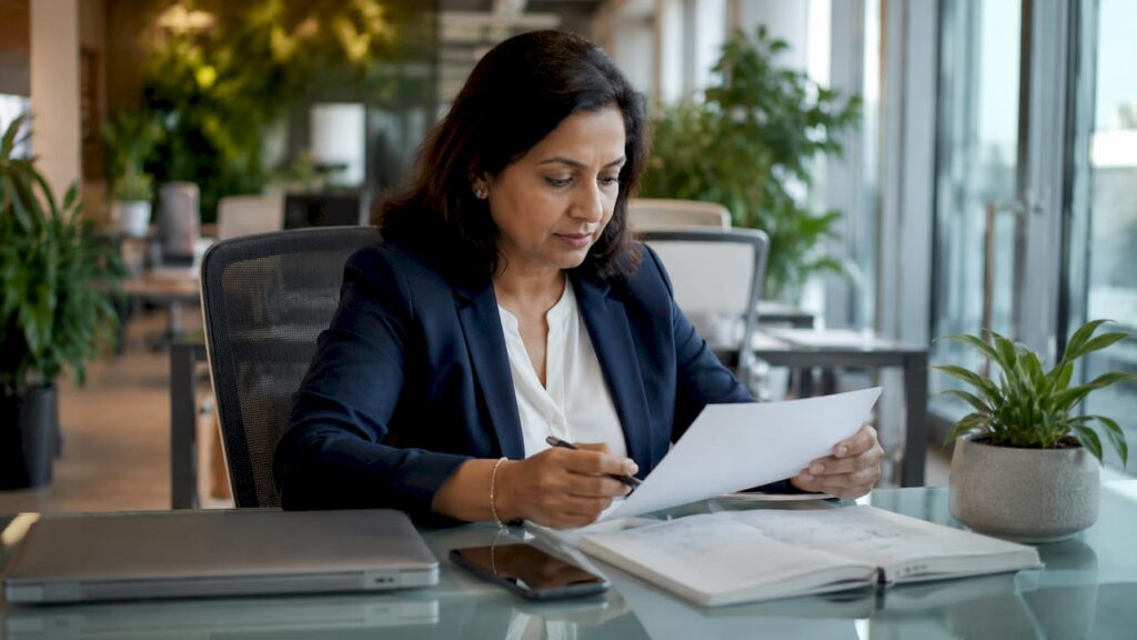 Business manager reviewing POS hardware checklist
